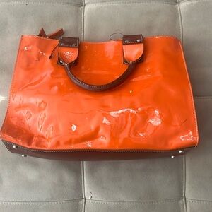 Stylish and Functional: Claudia Firenze Handbag in Burnt Orange and Brown